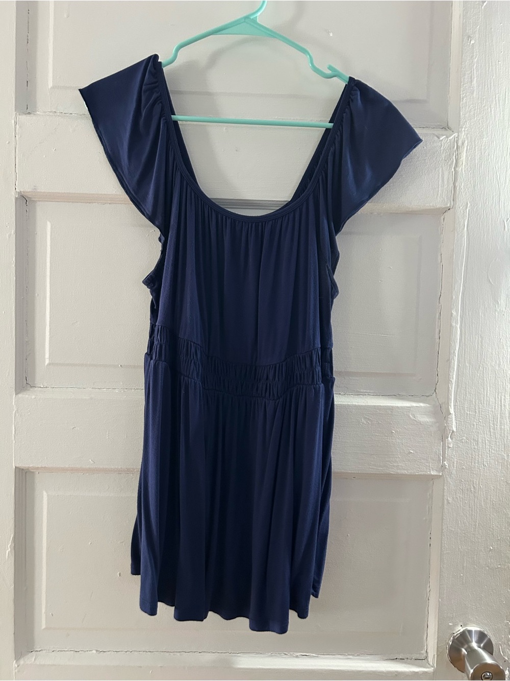 Navy Scoop Neck Flutter Sleeve top
Torrid size 0